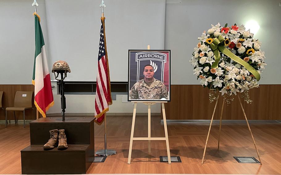 A photograph of Army Sgt. Devin Guary is displayed at a memorial service at Caserma Del Din in Vicenza, Italy Sept. 25, 2023. A paratrooper in the 173rd Airborne Brigade, Guary died in a car crash in Cittadella, Italy, on Aug. 14, 2023. 