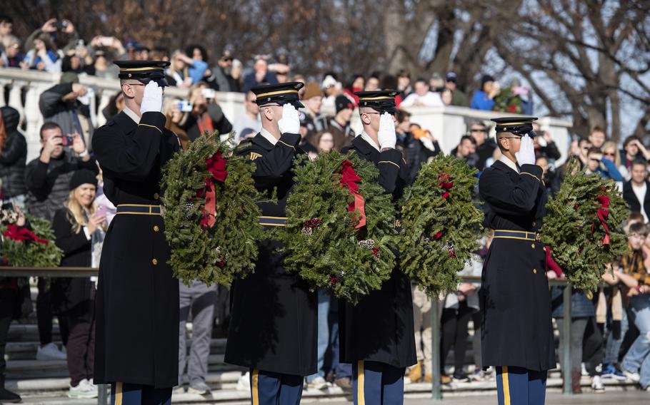 Tomb guards from the 3d Infantry Regiment (The Old Guard) place wreaths at the gravesites of the Unknown Soldiers at the Tomb of the Unknown at Arlington National Cemetery, Arlington, Va., Dec. 16, 2023. 