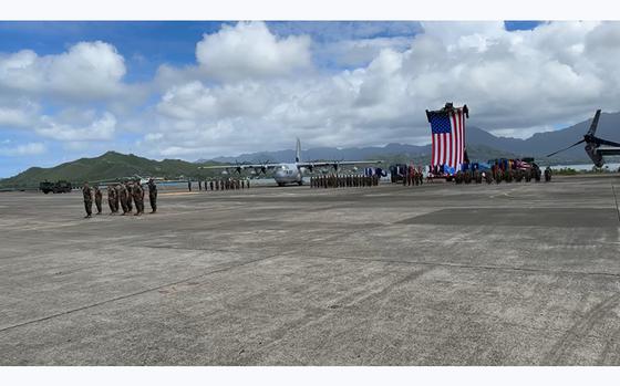 A video screen grab shows a scene from a change of command ceremony that took place on the edge of Kaneohe Bay at Marine Corps Base, Hawaii, on Thursday, May 25, 2023.
