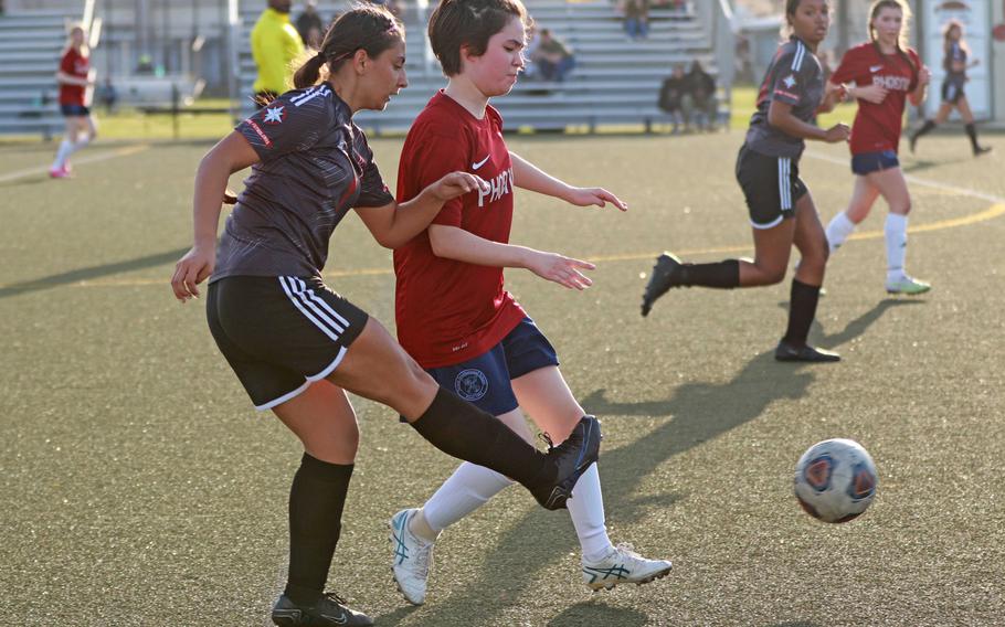 Nile C. Kinnick's Rachael Vite boots the ball upfield against Seisen International during Tuesday's Kanto Plain girls soccer match. The Phoenix and Red Devils played to a scoreless draw.
