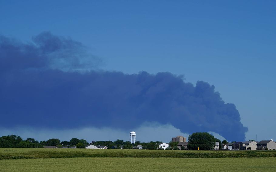 The Chemtool Inc. chemical fire can be seen burning as motorist travel down westbound I-90 on Monday, June 14, 2021, in Belvidere, Illinois.