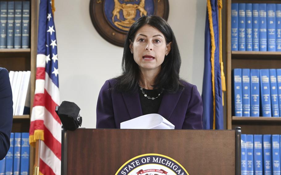Attorney General Dana Nessel announces charges for several security guards from Northland Mall in the 2014 death of McKenzie Cochran during a news conference in Detroit on Thursday, Oct. 14, 2021.  Nessel is asking federal prosecutors, Thursday, Jan. 13, 2022,  to open a criminal investigation into 16 Republicans who submitted false certificates stating they were the state’s presidential electors despite Joe Biden’s 154,000-vote victory in 2020.