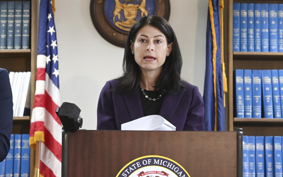 Attorney General Dana Nessel announces charges for several security guards from Northland Mall in the 2014 death of McKenzie Cochran during a news conference in Detroit on Thursday, Oct. 14, 2021. Nessel is asking federal prosecutors, Thursday, Jan. 13, 2022, to open a criminal investigation into 16 Republicans who submitted false certificates stating they were the state’s presidential electors despite Joe Biden’s 154,000-vote victory in 2020.
