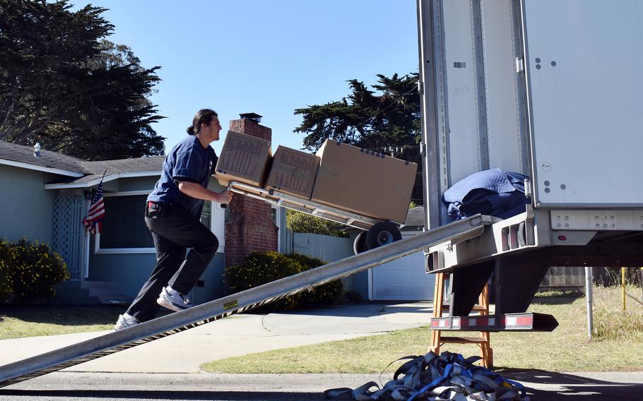 A person loads a truck in California.