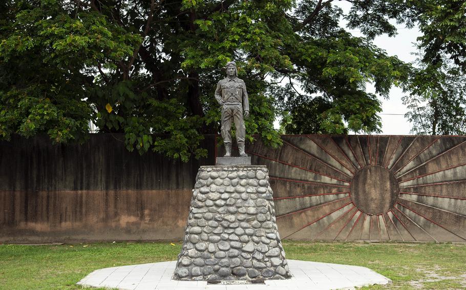 This roadside memorial near Clark Air Base in the Philippines reminds visitors that Japanese pilots on suicide missions took off nearby from “the very first Japanese Kamikaze Airfield.”