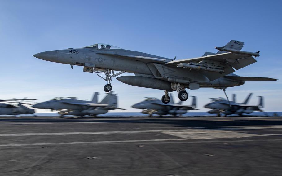 An F/A-18F Super Hornet aircraft, attached to Strike Fighter Squadron 136, lands on the flight deck of the aircraft carrier USS George H.W. Bush, Jan. 15, 2023, in the Adriatic Sea. A Super Hornet damaged by an engine fire in August should be back in action soon, after being repaired at sea, according to the Navy. 