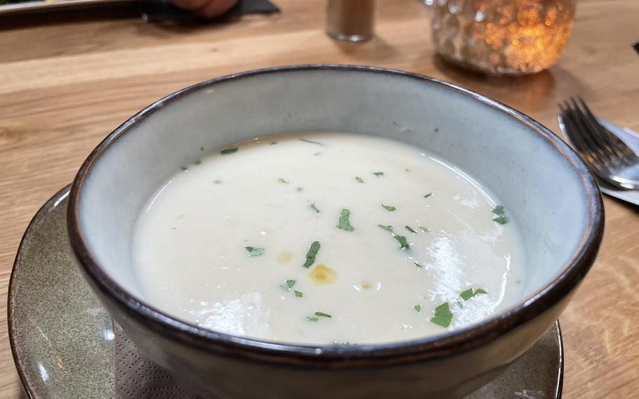 A bowl of creamy white soup.