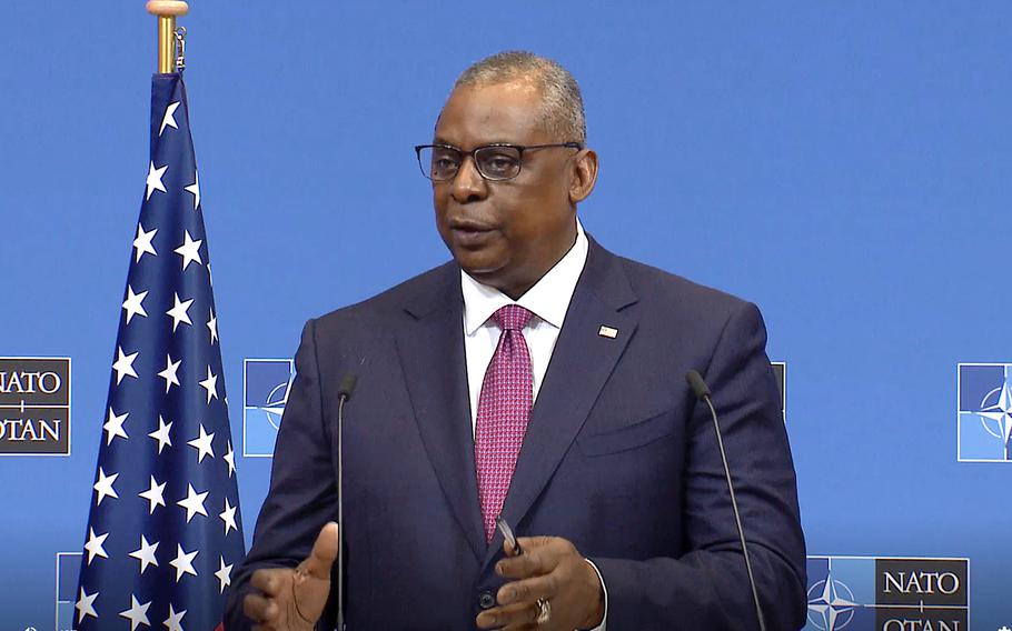 U.S. Defense Secretary Lloyd Austin answers a reporter's question following the second day of defense minister meetings at NATO headquarters in Brussels, Feb. 17, 2022.