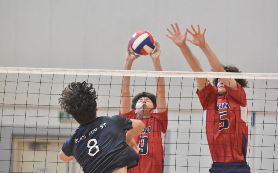 Black Forest Academy’s Ethan Hernandez tries to get the ball past the Aviano block of Pierce Dozier, left, and Gabriel Fabbro on Thursday, Oct. 27, 2022.

Kent Harris/Stars and Stripes