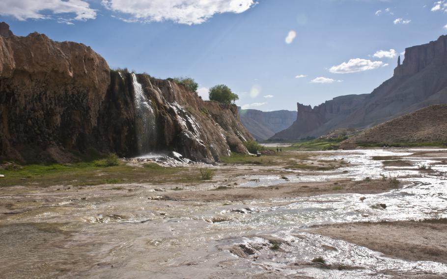 Water pours off the lip of the natural dam, created by minerals in the water over millions of years, at Band-e-Amir National Park, one of only two national parks in Afghanistan, in 2012. Afghanistan is sitting on deposits of minerals estimated to be worth $1 trillion or more, including what may be the world’s largest lithium reserves — if anyone can get them out of the ground.