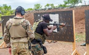 Members of Ghana's armed forces prepare for a range training exercise May 13, 2024, during Flintlock 24 in Daboya, Ghana. Nearly 30 countries, including the U.S., are participating this year in the annual exercise.