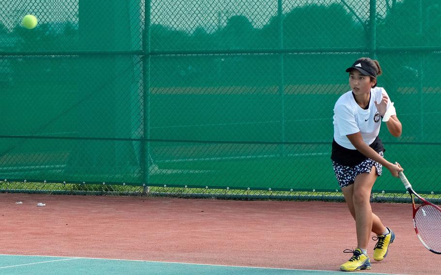 Humphreys' Lizzy Brown sends a forehand shot during Wednesday's DODEA-Korea tennis matches. Brown and her teammate Grace Son beat Osan's Abigail Robertson and Lauren Suh 8-0.