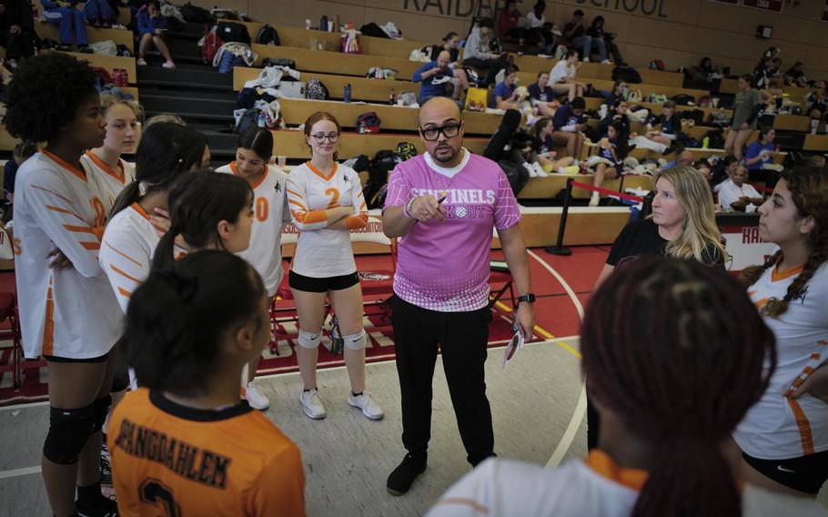 Spangdahlem Sentinels’ head coach Daniel Williams provides mid-game guidance to his team during a huddle at the DODEA Division III European volleyball fifth-place game on Oct. 27, 2023, in Kaiserslautern, Germany.