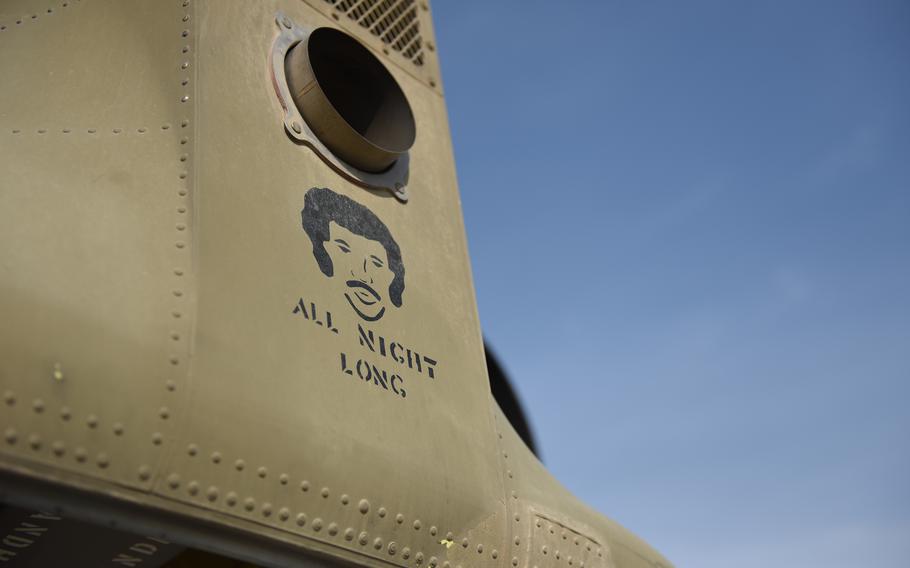 The symbol of Company B, 2nd Battalion, 211th Aviation Regiment, Iowa National Guard, seen on a CH-47 Chinook helicopter at Bagram Airfield, Afghanistan in 2016. The unit adopted the "All Night Long" slogan when they deployed to Iraq in 2011. 