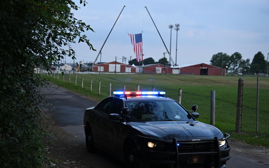 A police vehicle is seen Monday in Butler, Pa., after a shooting at a fairgrounds during a rally for former president Donald Trump on Saturday.