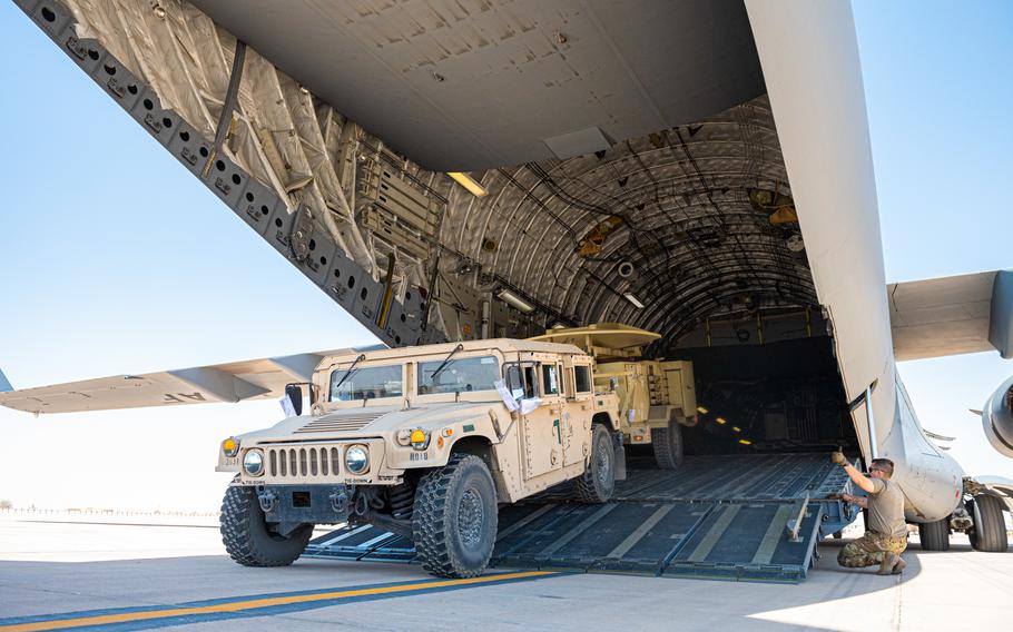 A U.S. Army satellite transportable terminal, towed by a tactical vehicle, drives down a C-17 Globemaster III ramp at Prince Sultan Air Base, Saudi Arabia, May 16, 2022. The 816th Expeditionary Airlift Squadron, which typically flew such cargo missions, was just deactivated.