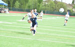 Naples' Emerson Shorey gets a shot on goal past Black Forest Academy defender Lily Cox, on Saturday, April 19, 2025, in the Wildcats' 4-1 victory in Vicenza, Italy.

Kent Harris/Stars and Stripes