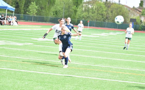 Naples' Emerson Shorey gets a shot on goal past Black Forest Academy defender Lily Cox, on Saturday, April 19, 2025, in the Wildcats' 4-1 victory in Vicenza, Italy.

Kent Harris/Stars and Stripes