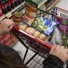 FILE - Jaqueline Benitez, who depends on California's SNAP benefits to help pay for food, shops for groceries at a supermarket in Bellflower, Calif., on Feb. 13, 2023. (AP Photo/Allison Dinner, File)