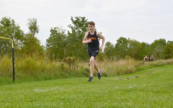 Lakenheath Lancer William Crofton on the back half of a 5-kilometer cross country race at RAF Molesworth, England, on Saturday. Crofton finished first in a time of 19 minutes, 40 seconds and qualified for the European Championships in two weeks at Baumholder, Germany. 