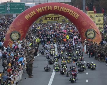 Wheelchair and hand-crank competitors start the 48th Marine Corps Marathon on Sunday, Oct. 29, 2023, in Arlington, Va.