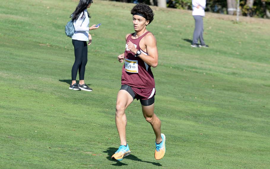 Boys Division II winner Tyler Gaines of Matthew C. Perry heads for the finish line.