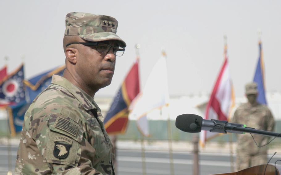 Army Lt. Gen. Ronald Clark speaks on the 20th anniversary of the 9/11 attacks during a ceremony at Camp Arifjan, Kuwait, Sept. 11, 2021.