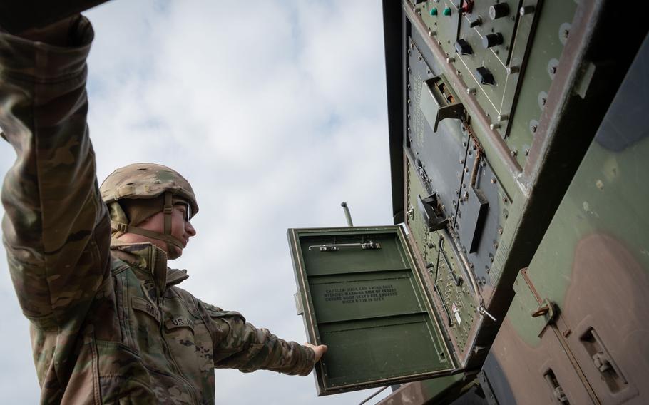 Pfc. Robert Smith of Delta Battery, 5th Battalion, 7th Air Defense Artillery Regiment checks a Patriot missile launching station in southeastern Poland on March 7, 2023.