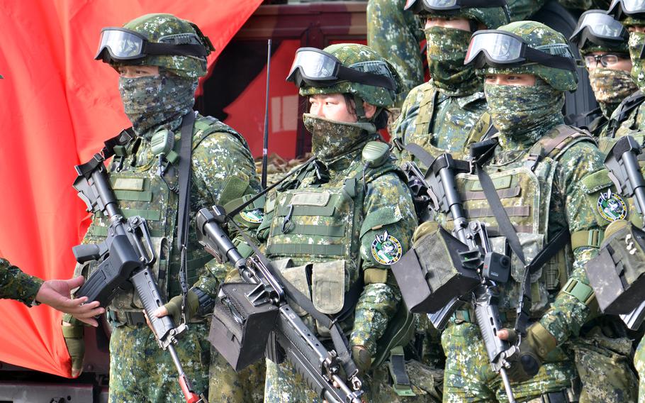 Taiwanese troops train near Kaohsiung, Taiwan, Jan. 11, 2023.