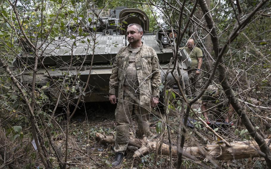 A Ukrainian Bradley commander with the call sign Frenchman, with his crew and U.S.-provided vehicle in the Zaporizhzhia region on Aug. 7. 