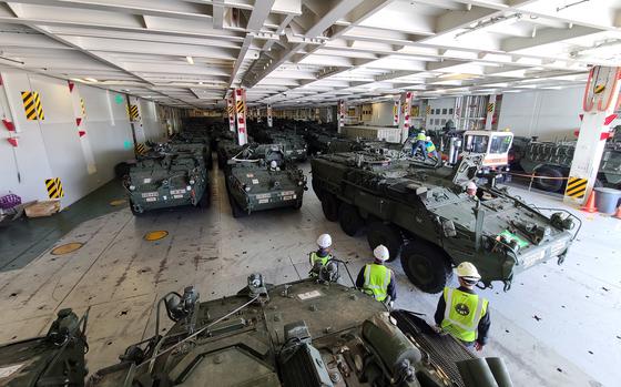 Stryker vehicles belonging to the 2nd Stryker Brigade Combat Team are offloaded at the Port of Pyeongtaek, South Korea, Oct. 8, 2022.