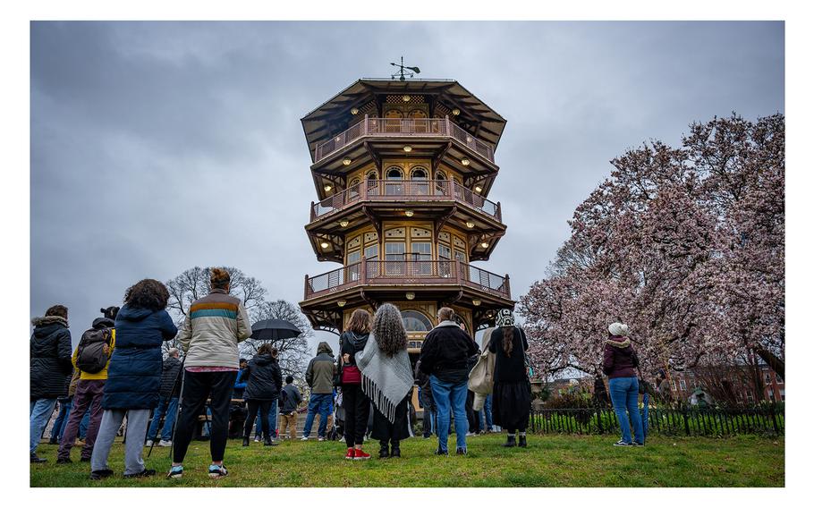 Area residents attend a prayer vigil on March 28, 2024, at the Patterson Park pagoda, for victims of the Francis Scott Key Bridge collapse.
