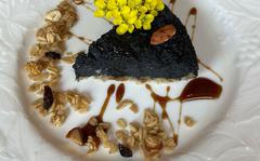 Black sesame cake from Hoccori Cafe, an eatery offer vegetarian and vegan dishes in Tachikawa, Japan. 
