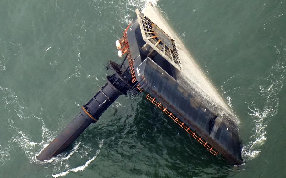 The capsized lift boat Seacor Power is seen seven miles off the coast of Louisiana in the Gulf of Mexico on April 18, 2021.