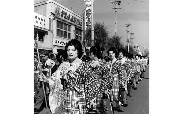 Hed: Fukuoka Parade, 1960

Kyushu Island, Japan, October 1960: Japanese women, dressed in traditional dress, carry lanterns advertising the Fukuoka Night Club. They and many other merchants of Hakata, Fukuoka's commercial district, participated in the Hakata Okunchi Festival parades here Saturday and Sunday, October 22 and 23, 1960. 

The two-day festival dates back to feudal days when merchants of Hakata originated the festival. It gives thanks to the gods for Autumn’s harvest, with the parades starting at the Kushida Shrine, dedicated to Hakata's Shinto deities Ohata Omikami (Kushida Omikami), Amaterasu Omikami, and Susanoo Omikami (Gion Omikami).

Apart from covering the U.S. military in the Pacific, staff at the Pacific editions of Stars and Stripes also covered - and photographed - local events and crafts, resulting in our archives holding some amazing shots like this one.
 
Check out Stars and Stripes Pacific's special 80th anniversary section here.
https://80.stripes.com/80th-home

META TAGS: Pacific; Japan; Kyushu Island; Itazuke Airbase; Hakata; Japanese culture; Japanese customs; Japanese tradition; festival; locals; parade
