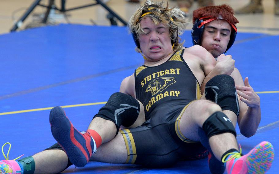 Stuttgart’s Alex Samler and Lakenheath’s Lucius Bowman grapple in a 157-pound match at the DODEA-Europe wrestling finals in Wiesbaden, Germany, Feb. 10, 2023. Bowman went on to win.