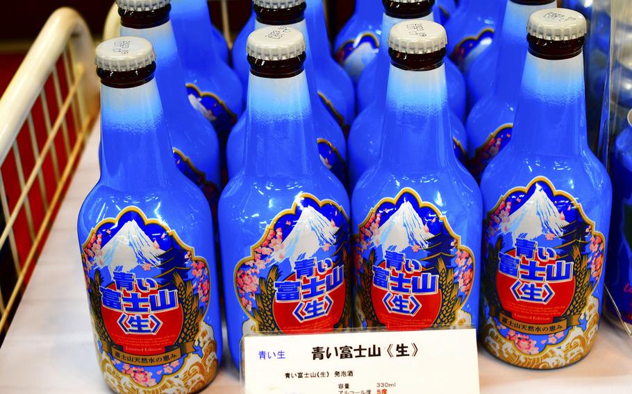Mount Fuji-branded hard cider is sold at Oshino Hakkai, a UNESCO site at the base of the iconic volcano, April 27, 2023.