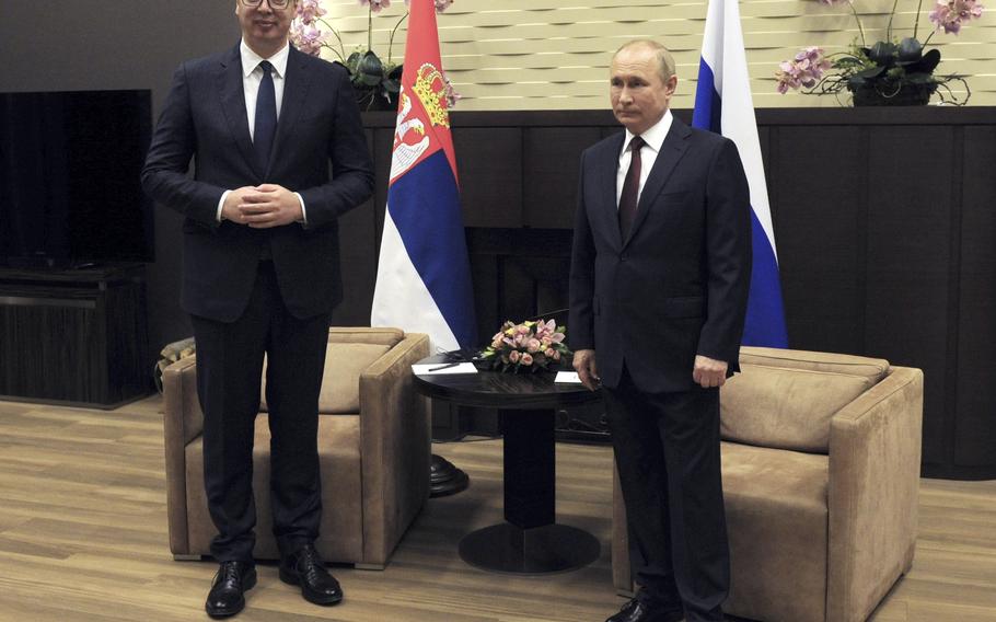 Russian President Vladimir Putin, right, and Serbian President Aleksandar Vucic pose during their meeting in Sochi, Russia, Thursday, Nov. 25, 2021. 