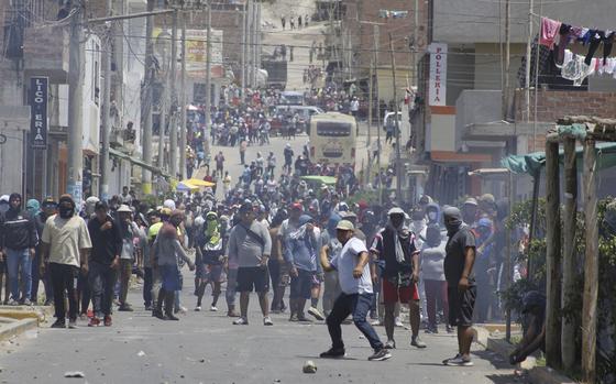 Demonstrators block Avenida Las Flores during protests in Trujillo, Peru, on Dec. 15, 2022. MUST CREDIT: Bloomberg photo by Arturo Gutarra Chavez.