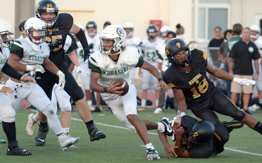 Kubasaki quarterback Trajon Weaver accounted for 247 yards total offense and all five Dragons touchdowns.