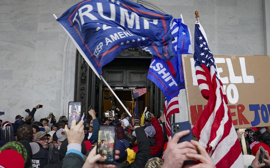 Rioters break into the Capitol in Washington on Jan. 6, 2021.