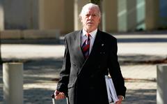Roberto Guillermo Bravo, a former Argentine navy officer, leaves federal court Monday, June 27, 2022, in Miami, where he is on trial for his alleged role in a 1972 massacre of political prisoners in his homeland.