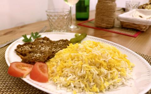 Among the items served at Soraya Persian Taberna and Tea House in Naples, Italy, are appetizers, sides, kebabs and rice platters with vegetarian options. This platter includes mirzaghasemi, a blend of eggplant and roasted tomatoes served with rice and optional eggs. 