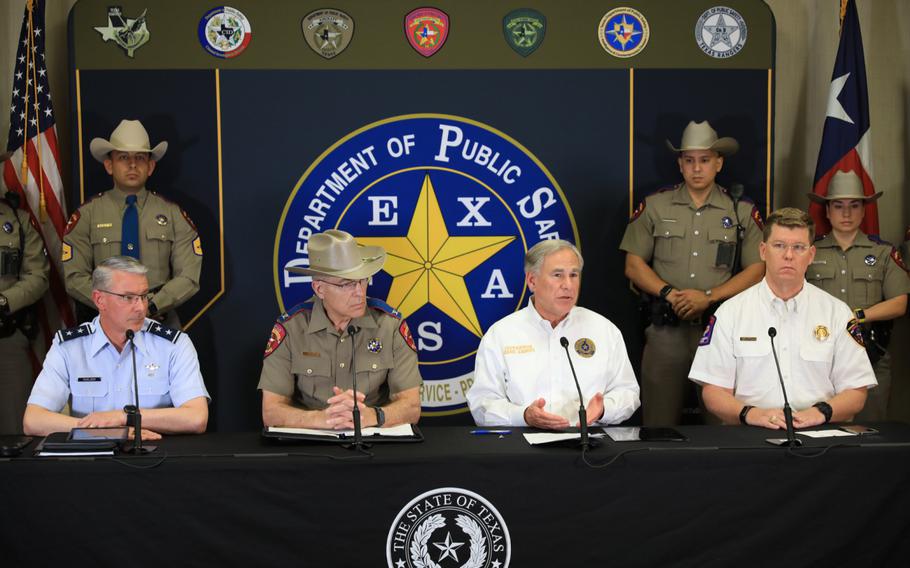 From left, Adjutant General of Texas Maj. Gen. Thomas Suelzer, Texas Department of Public Safety Director Steve McCraw, Texas Gov. Greg Abbott, and Texas Division of Emergency Management Chief Nim Kidd discuss Operation Lone Star during a news conference in Weslaco, Texas, on Wednesday, April 6, 2022. 