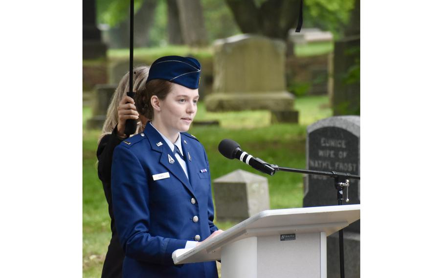 A Space Force guardian speaks at a podium