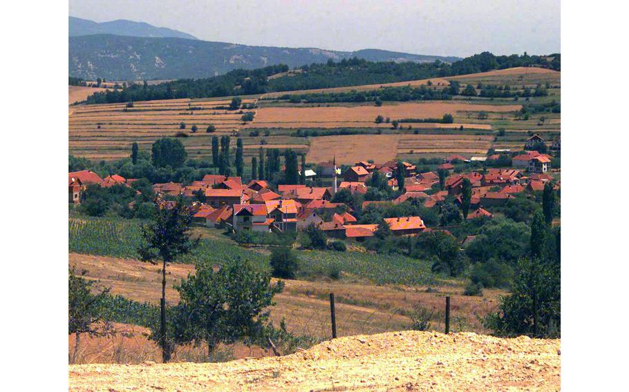 The Army observation point at Checkpoint Sapper overlooks the Albanian inhabited village of Dobrosin on the Serbian border, July 6, 2000.