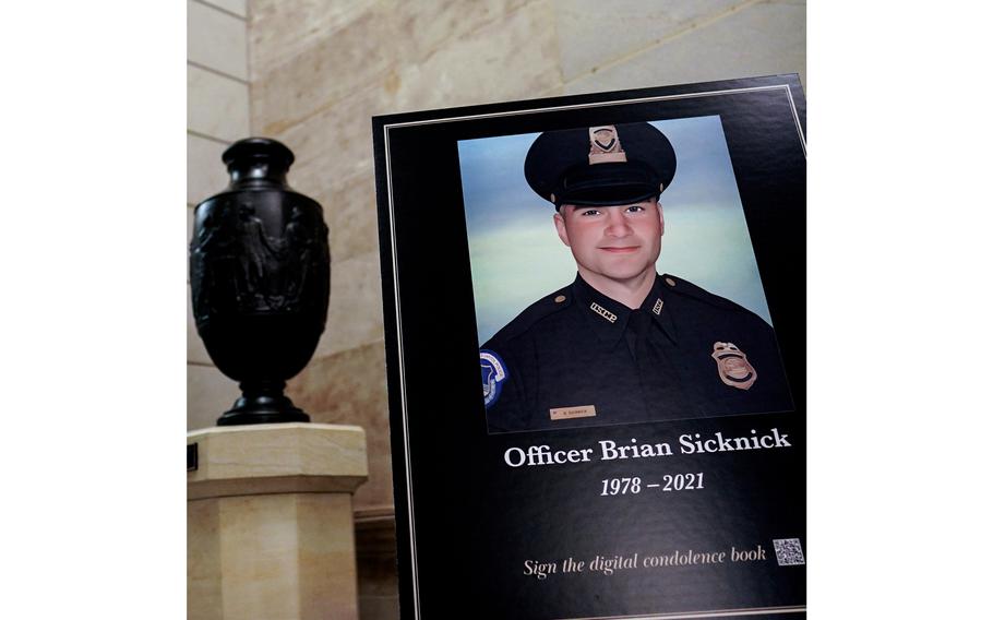 U.S. Capitol Police Officer Brian D. Sicknick, who died at age 42, is honored in a display just outside the Capitol Rotunda on Feb. 2, 2021.