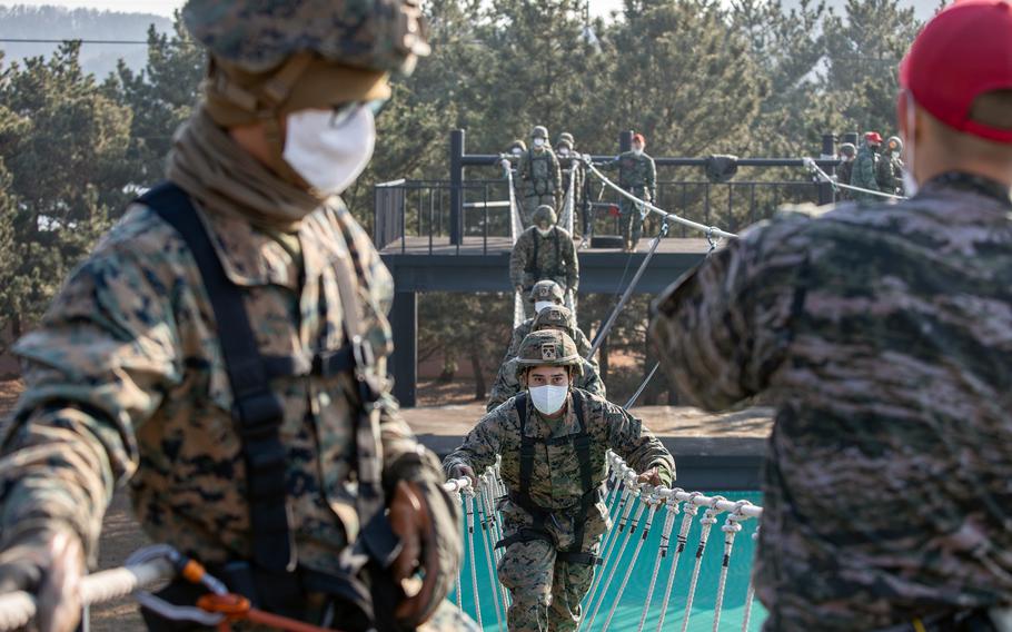 U.S. Marines work on their rappelling and rope work in Pohang, South Korea, Jan. 27, 2022. 
