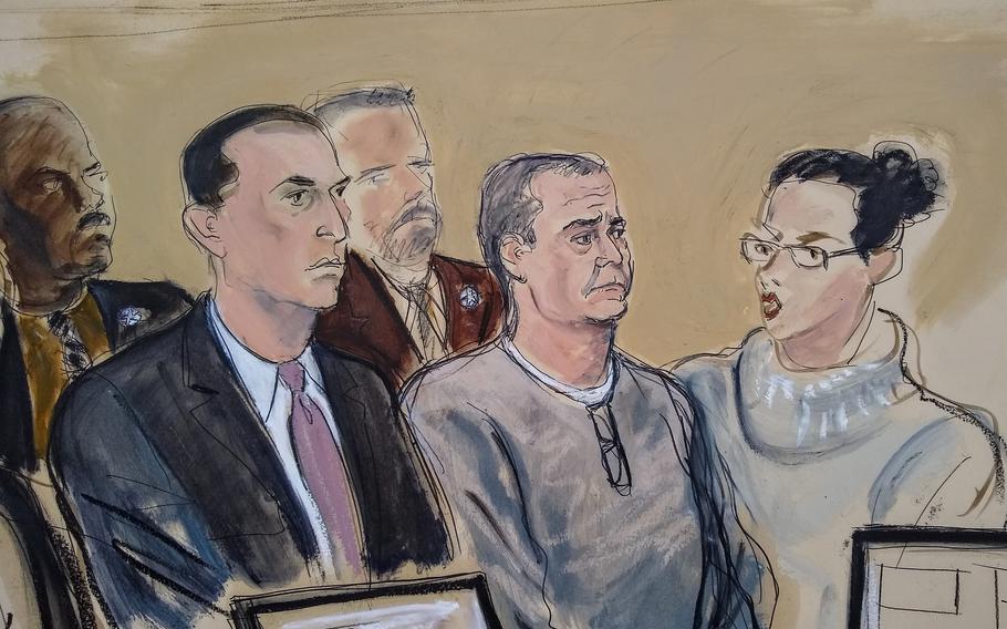 In this Jan 3, 2020, courtroom sketch, defense attorney Cesar de Castro, left, Mexico’s former top security official, Genaro García Luna, center, and a court interpreter appear for an arraignment hearing in Brooklyn federal court in New York, Jan. 3, 2020. García Luna is scheduled to go on trial Tuesday, Jan. 17, 2023, on charges he accepted millions of dollars in bribes in exchange for helping the powerful Sinaloa Cartel move drugs and its members avoid capture.