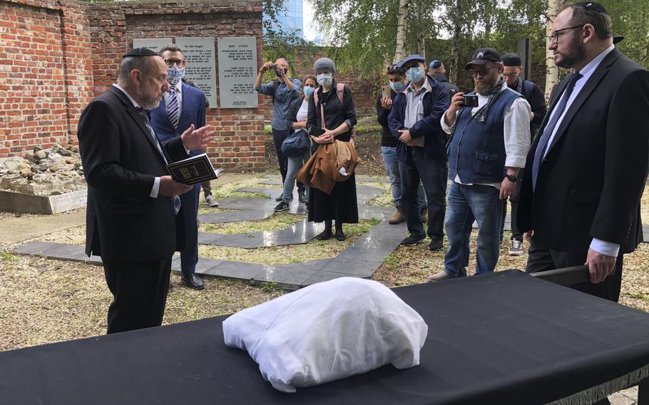 Warsaw's Jewish community held a funeral for an unidentified Holocaust victim after human remains were recently discovered in an area that belonged to the Warsaw Ghetto during World War II, in Warsaw, Poland, Tuesday Sept. 14, 2021.